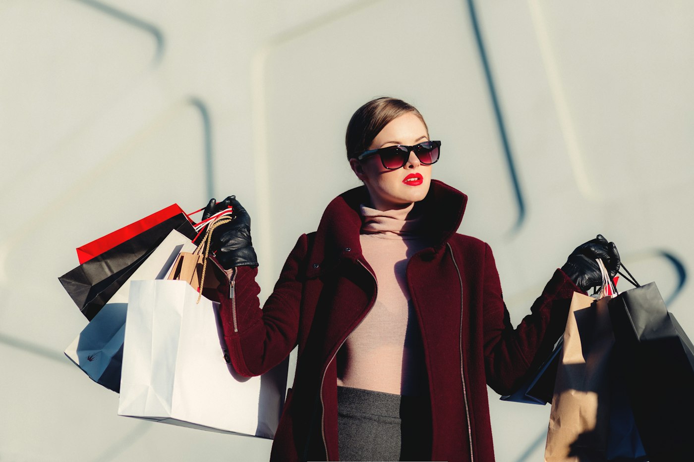 A person carrying several shopping bags